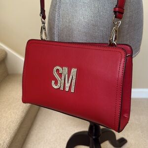 New Steve Madden Stylish Red Women's crossbody bag with rhinestone SM emblem.